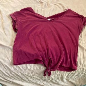 Maroon shirt kind of like a crop top